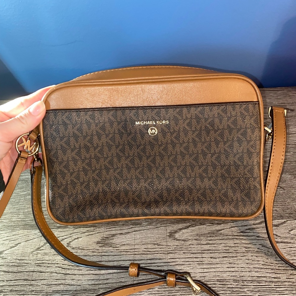Michael Kors Brown Messenger Bag with Monogram Pattern and Adjustable Strap